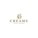 CREAMS Coffee and Desserts logo