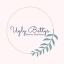 Ugly Betty’s Beauty Boutique logo