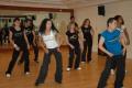 Muevete Fitness - the new workout with Latin Rhythm logo