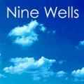 Nine Wells Caravan & Camping logo