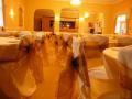 POSH CHAIR COVERS AND BOWS image 2