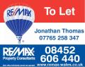 RE/MAX Property Consultants logo