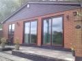 Riverside Hazeldene & Holly Tree Holiday Log Cabins. Severn Valley. logo