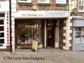 S C Rhodes Chemist logo