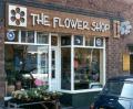 THE FLOWER SHOP logo