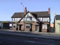 The Corner House Pub logo