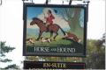 The Horse & Hounds logo