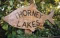 Thorney Lakes and Caravan Park logo