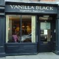 Vanilla Black Vegetarian Restaurant logo