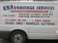 A .T DRAINAGE SERVICES logo