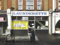 Excelsior Launderette logo