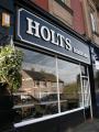 Holts Shoes logo