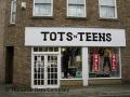 Tots n Teens logo