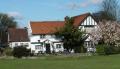 The Cricketers logo