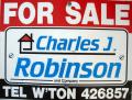 Charles J. Robinson and Company logo