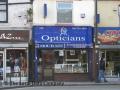 J S R Opticians logo