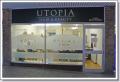Utopia Hair and Beauty Salon logo