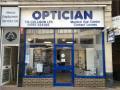 T H Collison Opticians logo