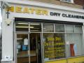 Neater Dry Cleaners logo