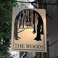 Woods Bar/Night Club logo