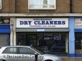 Northern Den Dry Cleaners logo