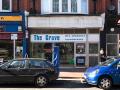 The Grove Launderette & Dry Cleaners logo