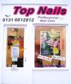 Top Nails logo