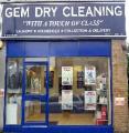GEM DRY CLEANING logo